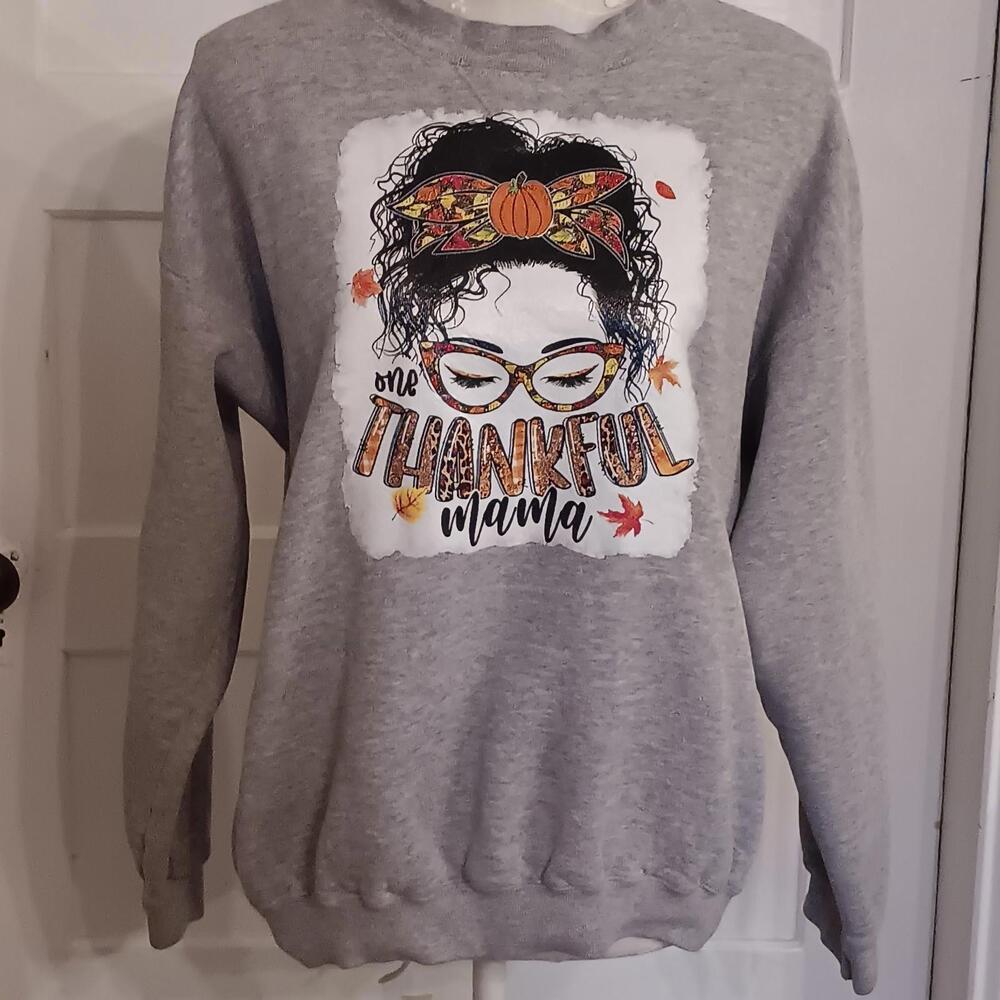 One Thankful Mama Fall Sweatshirt Messy Bun Dark Hair Whimsical Graphic Mom Life
